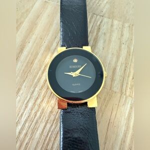 Rumours ladies black dial gold tone watch NEW BATTERY